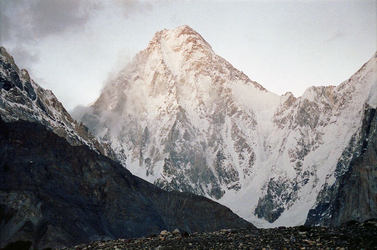 19 Gasherbrum IV At Sunrise From Concordia Gasherbrum IV (7925m) at sunrise from Concordia, with the northwest ridge on the left. The 3000m high Gasherbrum IV West Face was climbed by Robert Schauer and Wojciech Kurtyka in an alpine push between July 13 and 20, 1985. After reaching the North Summit, bad weather and extreme exhaustion forced them to descend, missing the main summit. Their climb was selected by Climbing magazine as the greatest Himalayan climb of the 20th century.